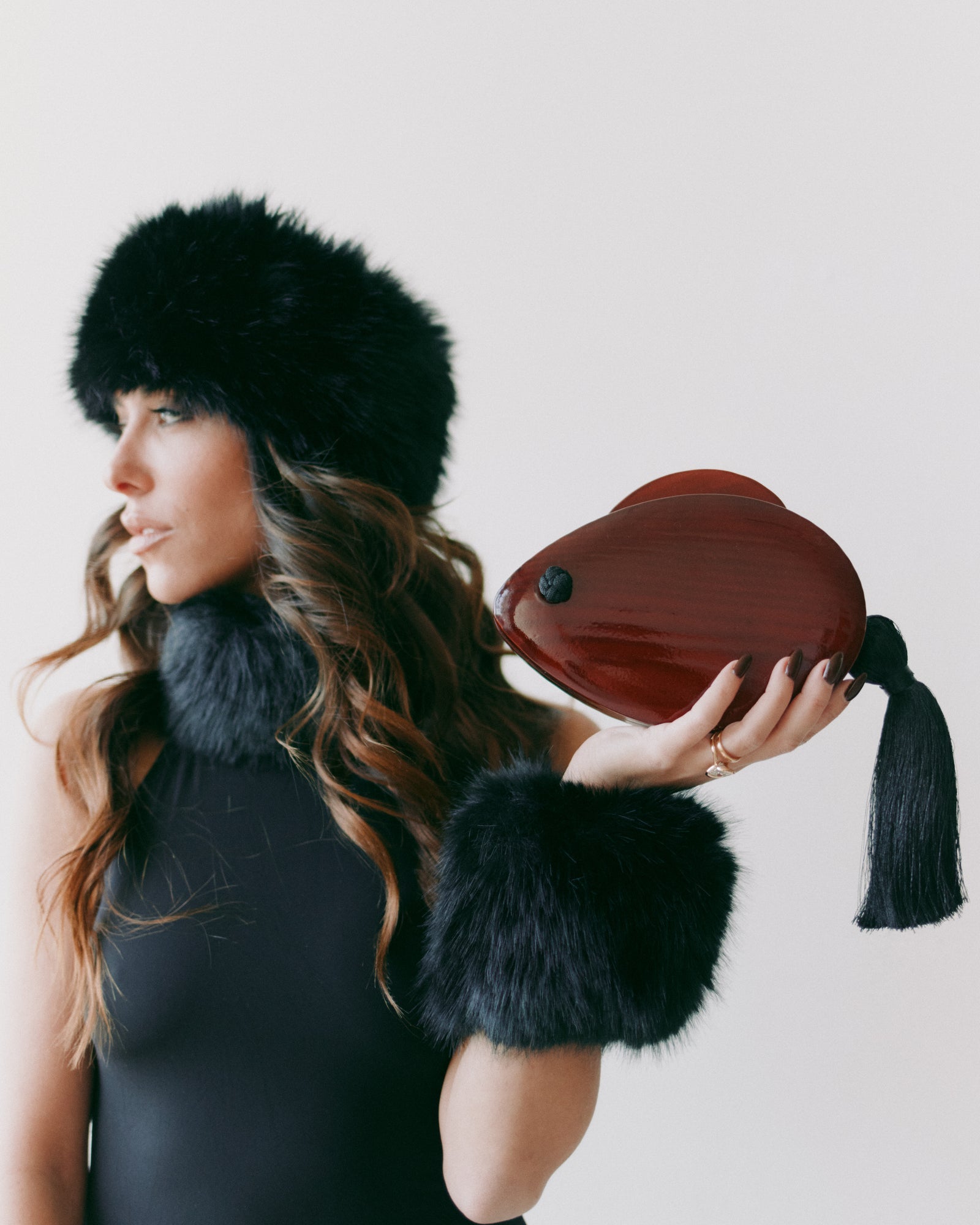 Sculptural wearable art accessory by VIN featuring bold craftsmanship, surreal design, and collectible fashion identity curated by Dot By Nana
